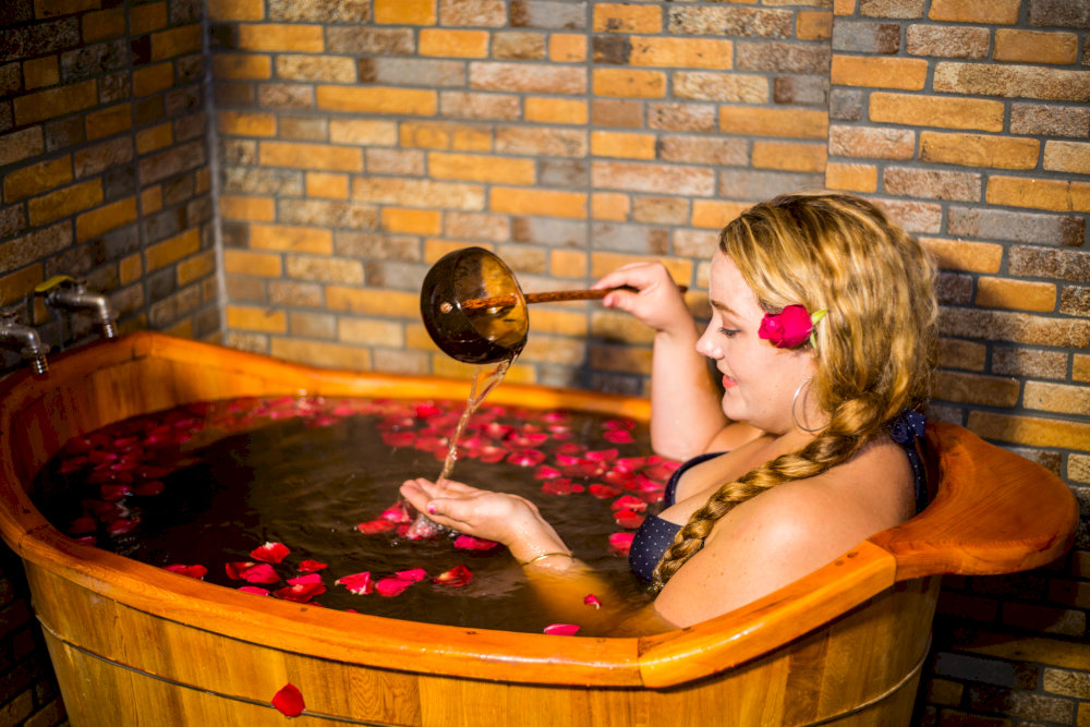 The aroma of the herbs blends with the surrounding mountain air, creating a spa-like moment in the heart of nature